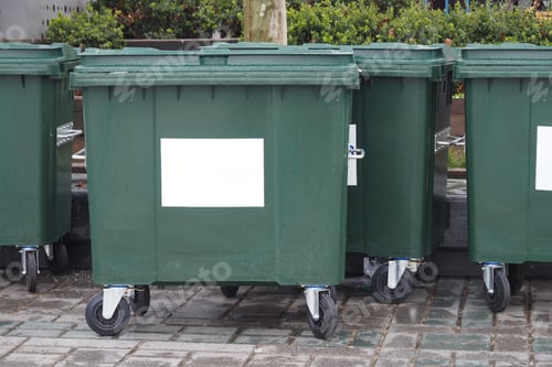 Preview: Metal green garbage can with wheels in countryside