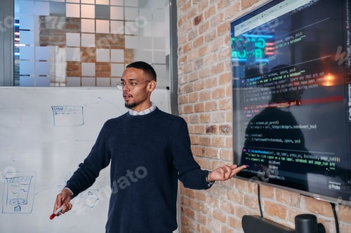 Preview: African American businessman delivers a compelling presentation of his business strategy to his