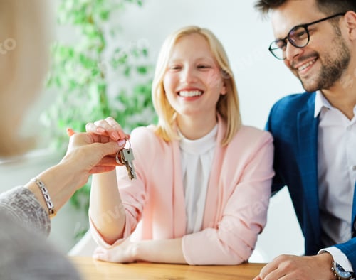 Preview: young couple new house keys buy real estate home agent agreement investment apartment