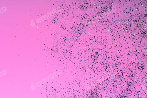 Preview: Multicolored sequins on a bright pink background.