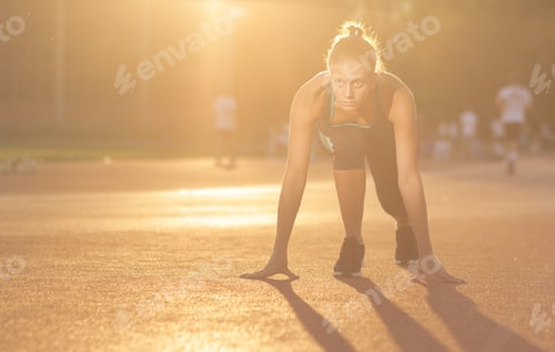 Preview: Young Girl Teenager Sprinter Start Position Outdoors Sunny Day Lens Flare