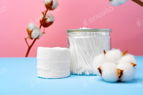 Preview: Cotton buds for cleaning ears on pink and blue background