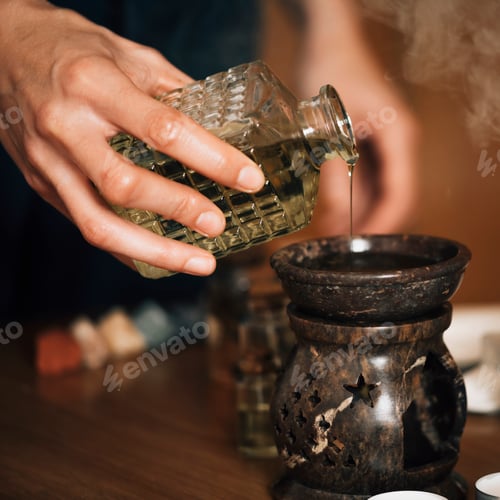 Preview: Ayurveda Aromatherapy Massage, Pouring Aromatic Oil in Essential Oil Diffuser