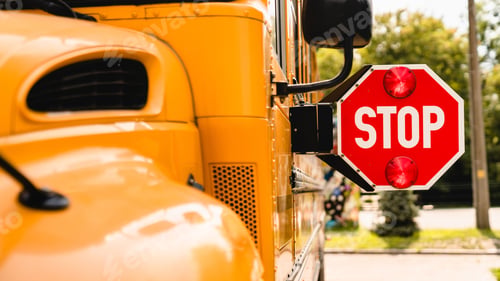 Preview: Yellow school bus. Stop sign. Be careful, schoolchildren crossing the road. New academic year