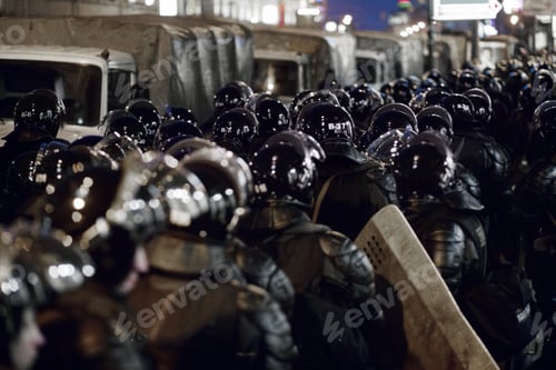 Preview: Lets create love not war. The army barricading a riot in the city.