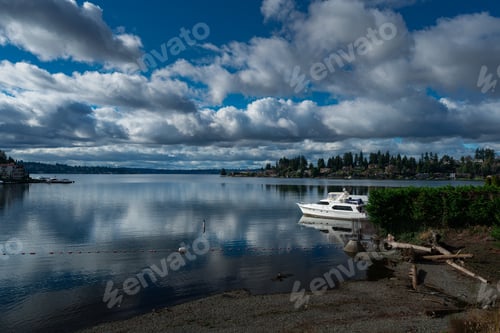 Preview: View of cloudy sky over the lake at the Meydenbauer Bay, Bellevue, Washington, United States