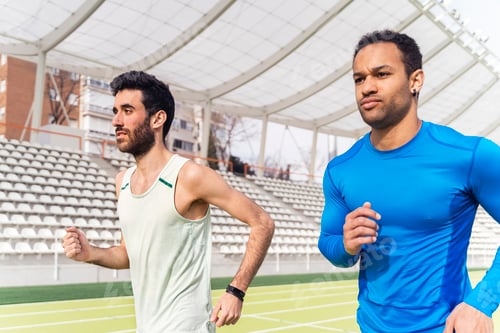 Preview: Front View of Two Athletes Running