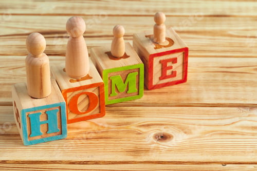 Preview: Wooden little family toys. House purchase, sale, rent concept