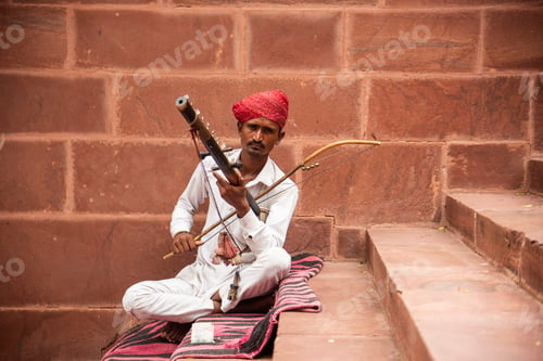 Preview: Street musician playing music instrument