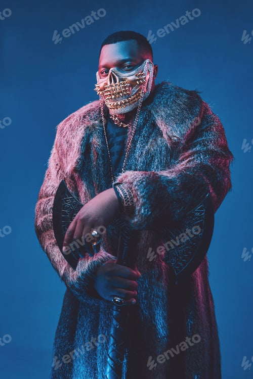 Preview: Evil african man with golden mask and huge axe