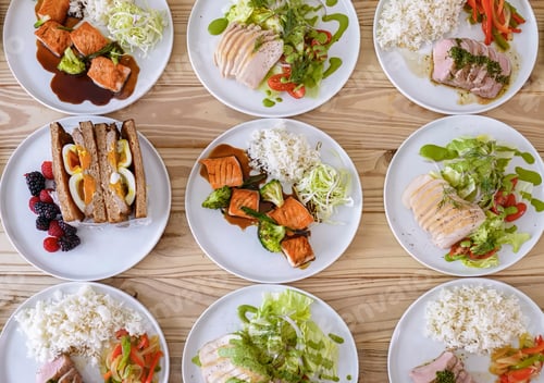 Preview: Set of plates with healthy balanced diet delicious meal with vegetables, chicken, rise. Homemade foo