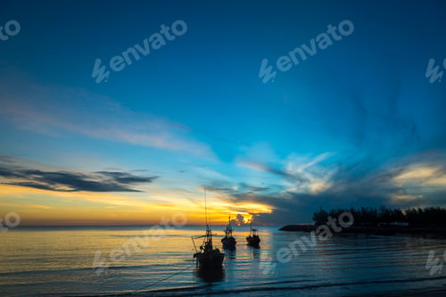 Preview: morning sea life with boat and fisherman, in sunrise