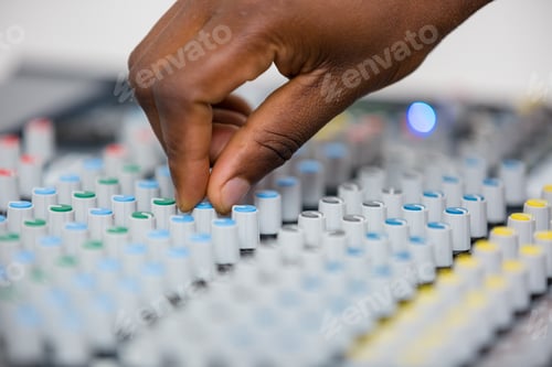 Preview: Audio visual sound mixer hands control buttons adjsuting Kenya East Africa