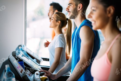 Preview: Picture of cheerful fitness team in gym