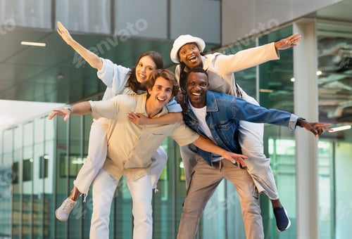 Preview: Funny multicultural friends having fun together, women piggybacking their boyfriends