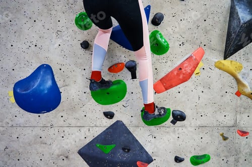 Preview: Woman training at bouldering gym. Active recreation, sports exercises