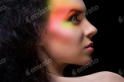 Preview: Attractive woman with colored make-up