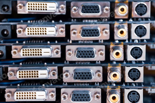 Preview: Close-up blurry metal sockets on a computer video board