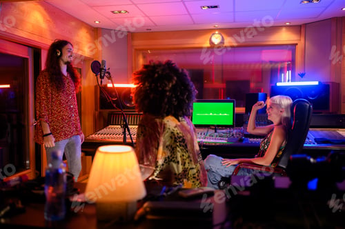 Preview: A singer is recording a song in a music studio.