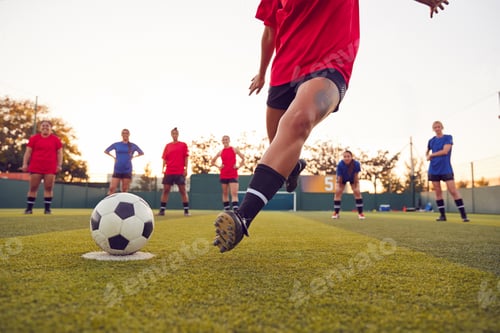 Preview: Close Up Of Player Taking Penalty During Womens Soccer Match