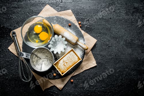 Preview: Ingredients for making dough on a stone Board.