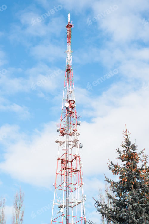 Preview: Television radio tower in the city against the backdrop of the cloudy sky. Satellite broadcasting