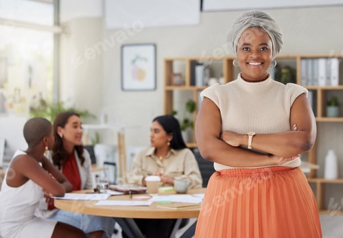 Preview: Portrait of smiling african american plus size business woman standing with her arms folded while c