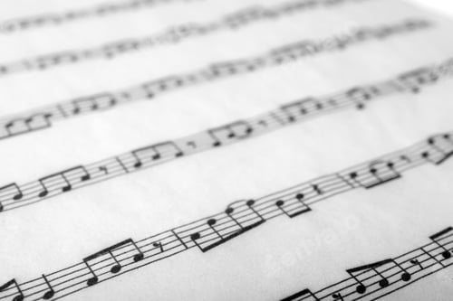 Preview: Sheet with music notes as background, closeup