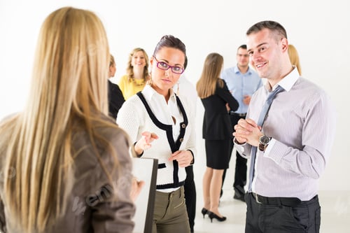 Preview: Business people discussing