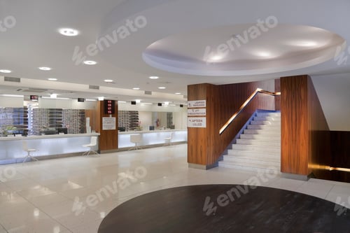 Preview: Waiting area and reception desk at a modern hospital, with signs and electronic display