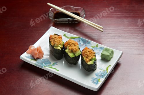 Preview: Japanese Gunkan sushi with salmon, on wooden background.