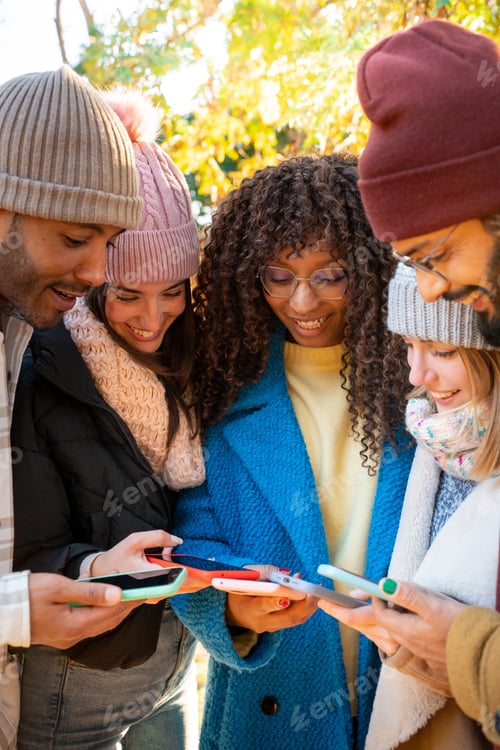 Preview: Vertical shot of group of people using smart phones. Millennials addicted to social media
