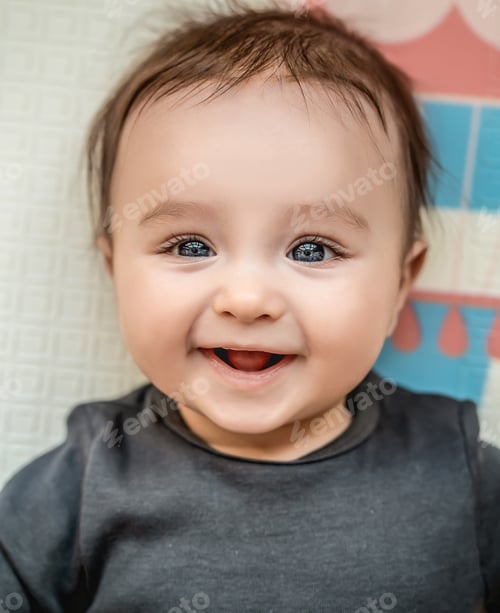 Preview: The beautiful baby boy is smiling