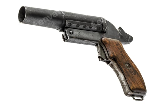 Preview: Old signal pistol, flare gun with the hammer cocked, isolated on white