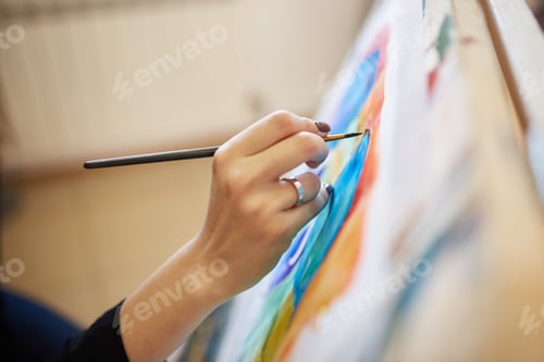 Preview: Process of painting picture at the easels in the art studio