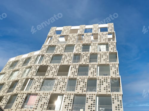 Preview: Exterior of modern white openwork house. Architectural detail of close-up on texture wall