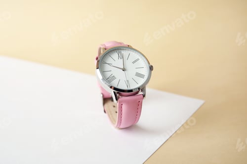 Preview: Stylish wrist watch on color background. Fashion accessory