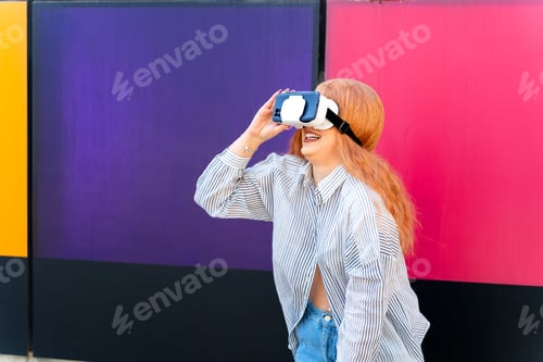 Preview: Redhead girl with virtual reality glasses