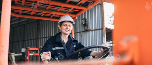 Preview: Industrial worker driving a forklift in the factory. Engineer is working and maintaining.