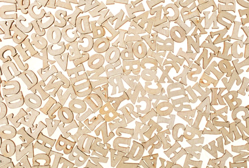Preview: wooden letters of the English alphabet on a gray gradient background
