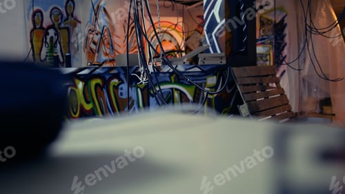 Preview: Electric cables hanging in derelict ghetto hideout used by vandals