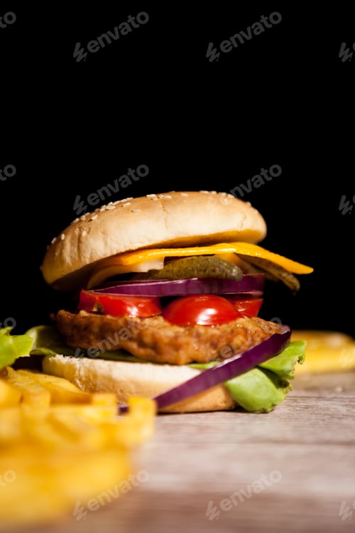 Preview: Classic cheeseburgers on wooden plate