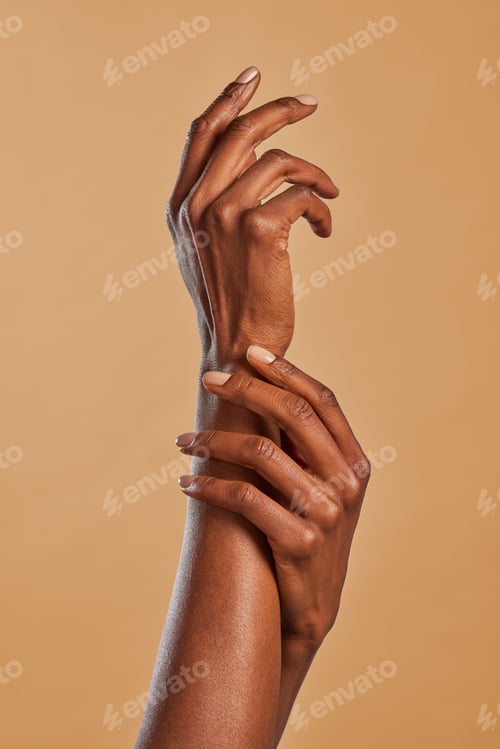 Preview: Beautiful black female hands pamper each other