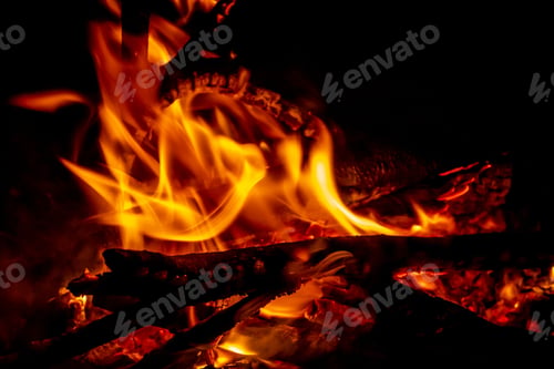 Preview: Glowing burning bonfire outdoors at night - great for wallpapers