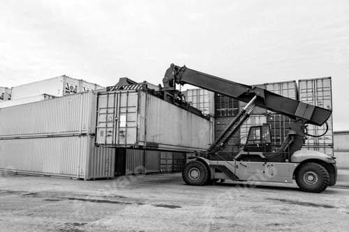 Preview: Mobile stacker handler in action at a container terminal.
