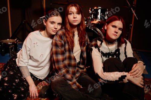 Preview: Portrait of Girl Band Comprising of Three Young Girls Posing in Recording Studio