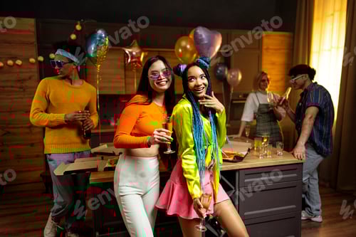 Preview: Group of friends making party at home on new year evening