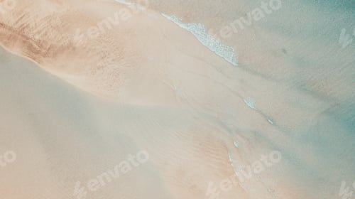 Preview: Vertical view of sand and beach with transparent clean sea water. Summer holiday vacation