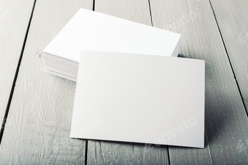 Preview: blank business cards on a wooden background