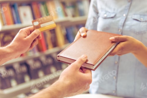 Preview: Girl with credit card at the bookshop